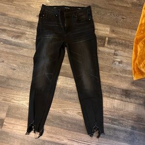 Black distressed skinny jeans.  No rips or tears like new.  Smoke/pet free home